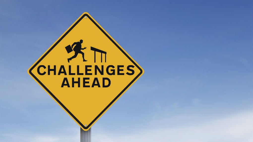 challenges ahead sign